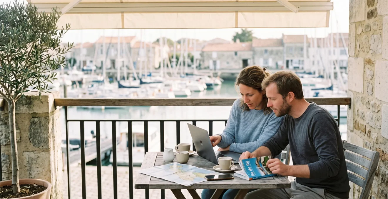 A couple comparing accommodation options on a laptop at a terrace table.